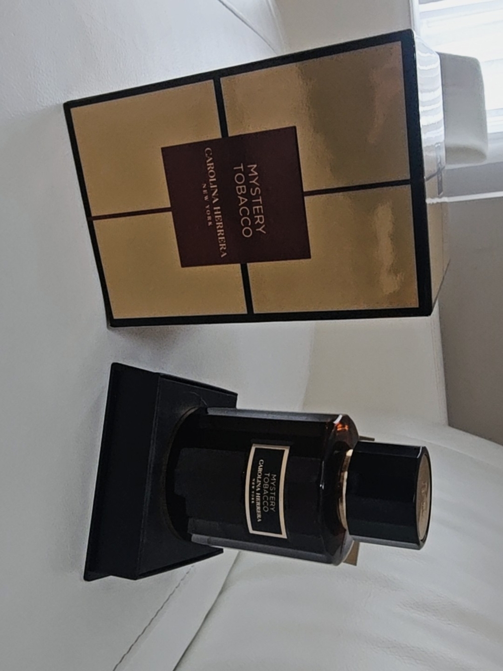 Mystery Tobacco by Carolina Herrera New York.